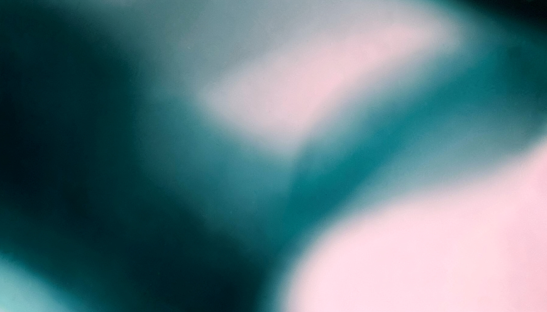 Abstract gradient composition in charcoal, deep teal and pale pink with a soft glow
